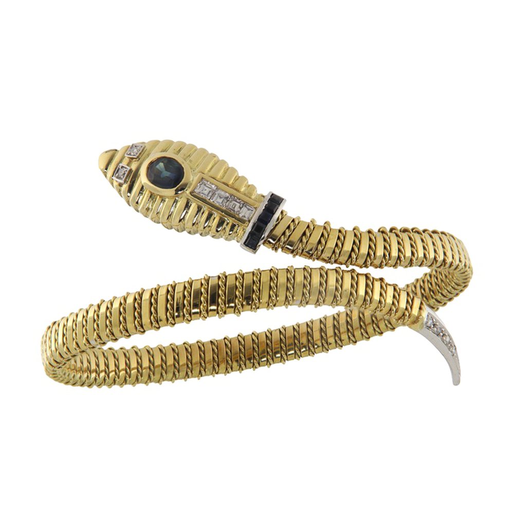 Semi-rigid serpent bracelet in yellow and white gold with diam, photograph 1