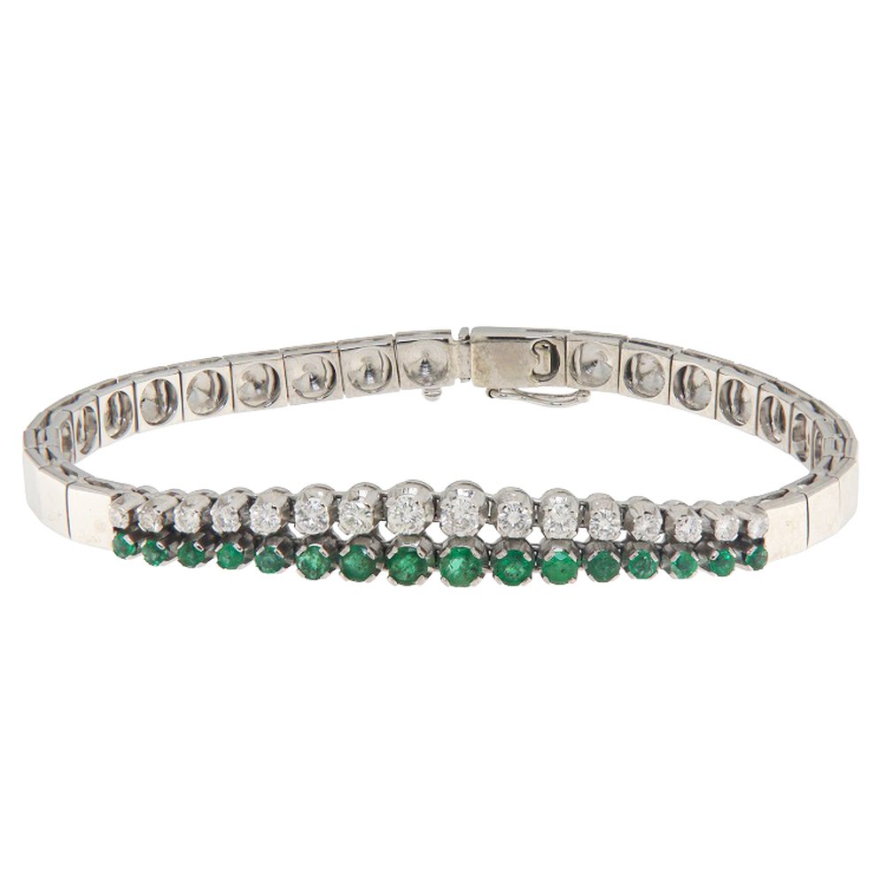 Semi-rigid bracelet in white gold with diamonds and emeralds, photograph 1